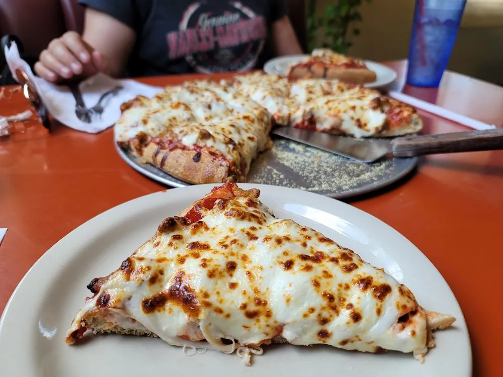 Is Medium Size Cheese and Sausage Pizza